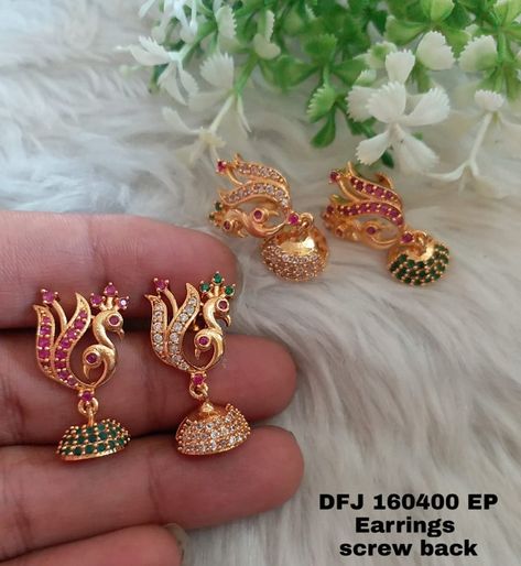 Stunning one gram gold earrings in dancing peacock design. Earrings studded with multi color stones. 10 October 2019 One Gram Gold Earrings, Dancing Peacock, Gold Earrings Indian, Bridal Jewellery Inspiration, Gold Jhumka Earrings, Gold Pearl Jewelry, 10 October, Gold Jewelry Outfits, Gold Earrings Models