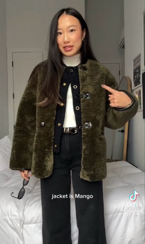 https://green fur coat with black cardigan and white turtle neck. With black jeans. Black belt. Gold accessories. Cold weather outfit ideas. Winter outfit inspo. Ballet flag outfit. Chic winter outfit. Outfit Inspo Black Jeans, Ballet Flat Outfit, Layered Outfit Ideas, New York Outfit Ideas, Outfit Ideas Cold Weather, Sophia Richie Style, Outfit Ideas Cold, Layered Winter Outfits, Chic Winter Outfit