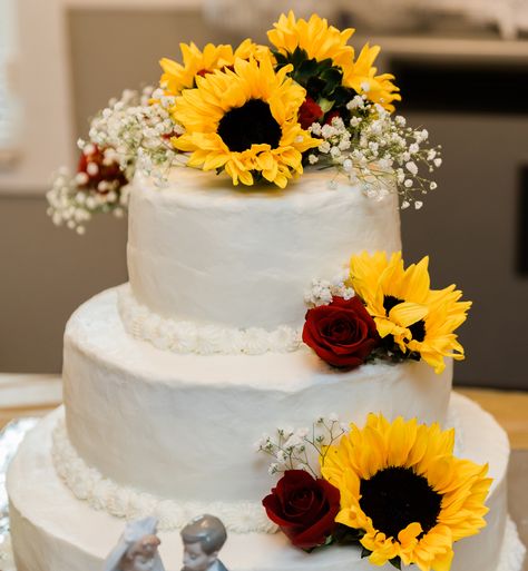 Sunflowers and roses wedding cake I made for my son and his wife ❤️ Girly Wedding Cake, Wedding Cake Sunflower And Roses, Red And Yellow Wedding Cake, Sunflower Rose Wedding Cake, Sunflower And Roses Wedding Cake, Sunflower And Rose Wedding Cake, Cakes With Sunflowers, Jake 2024, Sunflower And Rose Wedding