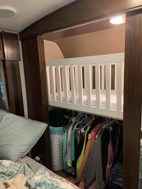 Toy Hauler Nursery, Rv Play Area, Nursery Ideas In A Camper, Rv Sleeping Ideas, Rv Toddler Bed Ideas, Crib In Rv, Camper Living With Newborn, Camper Crib Ideas, Nursery In A Camper