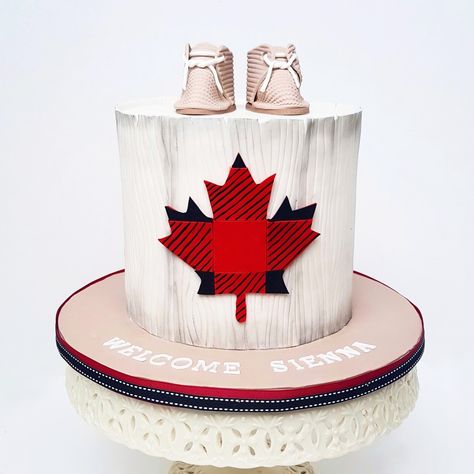 Canada Themed Baby Shower Cake topped with Baby Booties | Eini & Co. Canada Cake, Travel Cake, French Macarons, Baby Shower Cake, Canada Day, Cake Toppings, Shower Cake, Flexibility Workout, Baby Shower Cakes