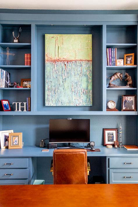 Make your home office stand out with custom blue built-ins that offer both style and a bold touch. The centerpiece custom artwork adds a pop of color, creating a vibrant and inspiring workspace. Love this look? Save this pin for your own office design! custom built-ins, blue cabinetry, home office design, stylish workspace, office decor Custom Built In Desk, Blue Cabinetry, Workspace Office, Stylish Home Office, Blue Desk, Office Cupboards, Blue Office, Traditional Office, Man Office