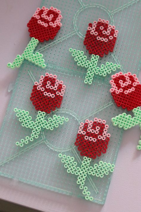 Perler Beads Astetic, Aesthetic Melty Bead Ideas, Pearler Bead Flower Patterns, Pearled Bead Ideas Aesthetic, Perler Beads Ideas Bookmark, Flower Melty Beads, Perler Bead Rose Pattern, Hama Beads Patterns Flower, Perler Bead Patterns Plants