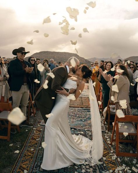 Your Wedding Aesthetics on Instagram: "A Nevada Desert Wedding in Sage and Mustard Tones with Eclectic Decor✨  Lauren and Jon-Michael’s modern, eclectic, and vintage-themed wedding was held at a cactus farm in the stunning Red Rock Valley, Nevada. Thanks to the meticulous work of @emberandstoneevents, every detail, from the vibrant florals and unique color palette to the personalized decor, reflected their vision and deep love for nature and adventure.  Click the link in the bio to read the full story!  Planning, Design & Styling: @emberandstoneevents Venue: @cactusjoes Photographer: @kassiegunnphoto Florals: @nightgardenfloral Dress: @preajames_bridal Makeup: @setandfurylv Hair: @megdelacruzhair Shoes: @bellabelleshoes Headpiece: @mariaelenaheadpieces Accessories: @beltsbucklesbolos  Bar: Preajames Bridal, Unique Color Palette, Cactus Farm, Rock Valley, Wedding Aesthetics, Nevada Desert, Vibrant Florals, Story Planning, Vintage Wedding Theme