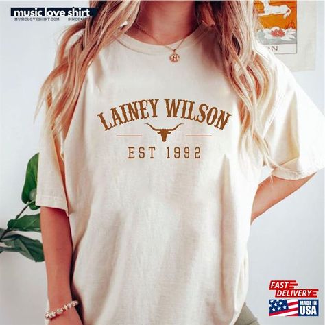 Lainey Wilson Bull Skull T-Shirt Cowboy Country Shirt Music Sweatshirt Check more at https://musicloveshirt.com/product/lainey-wilson-bull-skull-t-shirt-cowboy-country-shirt-music-sweatshirt/ Lainey Wilson Outfits, Country Fest, Lainey Wilson, Music Sweatshirts, Fest Outfits, Texas Shirts, Iconic Album Covers, Shirt Designs For Men, Dream Outfits