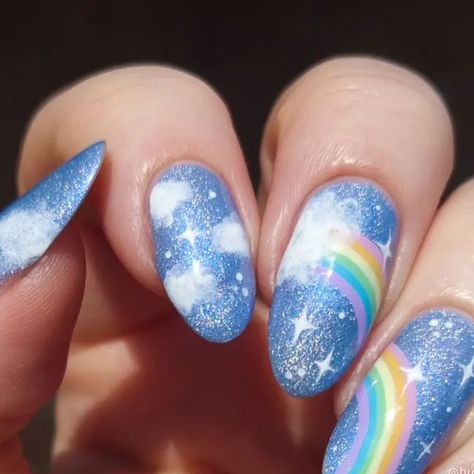 Elise 🇦🇺🌯 on Instagram: "Happy birthday @myrznails ❤️❤️   I hope you have an absolutely wonderful birthday! I had such a hard time picking a recreation because you have so many gorgeous designs, but I ended up opting for this gorgeous cloudy rainbow look!   I don't have your fancy pens 🙈 so I tweezed off some sponge to dab the clouds on instead   You can check out the rest of the submissions at #myrtos25thbday 🎉   Thankyou so much to our hosts! @aculednails  @glitter__polish  @graycatnailart  @simply.holo.nails   @holotaco - Spyglass @mooncat - Technicolor Dreams collection cremes   #nail #nailart #nailpolish #nailsnailsnails #nailspiration #nailsonfleek #nailartaddict #nails #naildesign #nailstagram #nailsofinstagram #indiepolish #mani #manicure #naturalnails #nailsoftheday #notd #na Cloud Nail Art Designs, Rain Cloud Nails, Cloud Nail Designs Tutorial, Nail Ideas Clouds, Rainbow Sky Nails, Rainbow And Clouds Nails, Cloud Nails, Glitter Polish, Holo Nails