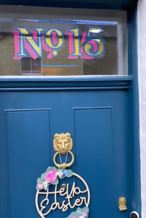 Gold leaf hand painted door number on glass window above front door in navy pink and gold Hand Painted House Number Sign, Retro House Numbers, Door Signs Diy Entrance, Fanlight Number, Front Door Number Ideas, Painted House Number Sign, Transom Front Door, Door Numbers Ideas, Painted House Numbers