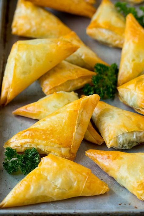 Spanakopita Recipe #appetizer #snack #spinach #cheese #dinneratthezoo Healthy Spanakopita Recipe, Spinach Phyllo Recipes, Spanakopita Recipe Easy, Hearty Appetizer, Spanakopita Recipe, Cheese Triangles, Phyllo Pastry, Greek Pastries, Pita Recipes