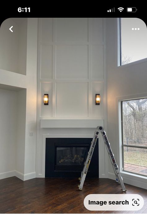 Corner Fireplace With High Ceiling, Corner Fireplace With Tall Ceiling, Corner Fireplace Tall Ceilings, Trimmed Fireplace Wall, Corner Fireplace High Ceiling, Accent Wall Ideas High Ceilings, Vault Ceiling Fireplace, Two Story Corner Fireplace Ideas, Fireplace Next To Stairs