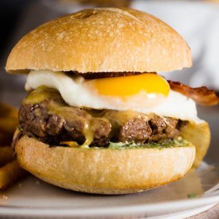 These French Bistro Burgers are full of over-the-top flavor: an herb aioli, smoked gouda cheese, bacon and a sunnyside up egg. Serve with rosemary fries or a frisee salad. #BurgerMonth #GirlCarnivore Burger With Egg, Cheese Burger Recipe, Cheeseburger Recipes Homemade, Herb Aioli, Homemade Burger Recipe, Easy Burger Recipe, Sunnyside Up Eggs, Smoked Gouda Cheese, Cheeseburger Recipe