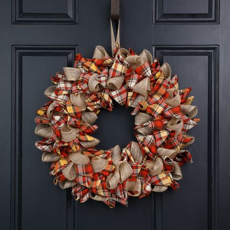 "Buy Glitzhome® 18.5\" Fall Plaid Fabric Wreath at Michaels. com. This wreath will create a comfortable atmosphere for your family and friends. This wreath is featured with warm and inviting plaid fabric, with the color of orange, yellow and linen. This wreath will create a comfortable atmosphere for your family and friends. Hang it in your doorway or on the wall and let the holiday festivities begin. Details: Multicolor 18.5\" x 3.5\" x 18.5\" Polyester fabric | Glitzhome® 18.5\" Fall Plaid Fab Plaid Wreath, Fall Decor Wreaths, Fabric Wreath, Harvest Thanksgiving, Fall Thanksgiving Decor, Rag Wreath, Artificial Wreath, Fall Plaid, Fall Fabric