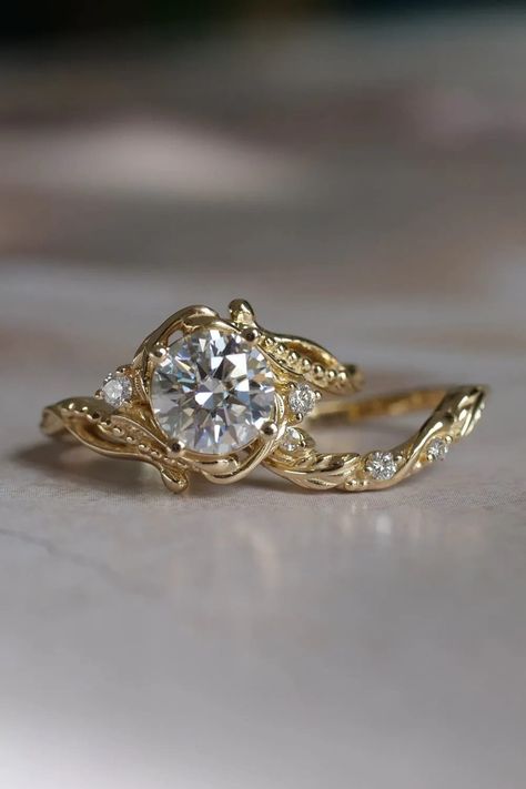 Moissanite bridal ring set in yellow gold. A sustainable choice for those who wish to avoid natural diamonds. European Folklore, Ring Tattoo, Engagement Ring Style, Water Nymph, Nature Engagement Ring, Perfect Tattoo, Nature Inspired Engagement Ring, Stacked Wedding Rings, Water Spirit