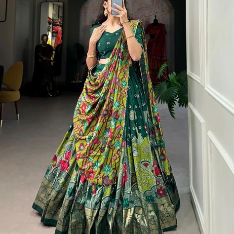 *🌷Lehenga Choli🌷* Infuse Your Wardrobe with Southern Grace—Tussar Silk Kalamkari Print Lehenga Choli Featuring a Sophisticated Foil Work Border 🪷 *Catalogue : MUSAFIR* *Lehenga(Stitched)* Lehenga Fabric : Tussar Silk Lehenga Work : Kalamkari Print With Foil Work Border Lehenga Waist : SUPPORTED UP TO 42 Lehenga Closer : Drawstring With Heavy Tassels and Zip Stitching : Stitched With Canvas and attached with Can Can Length : 41 Flair : 3.80 Meter Inner : Micro Cotton *Blouse(Unstitched)... Zip Stitching, Lehenga Stitched, Print Lehenga, Kalamkari Print, Lehenga Fabric, Southern Grace, Stitched Lehenga, Can Can, Silk Lehenga