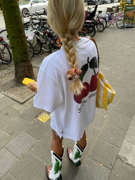 Cherry t-shirt, levis shorts , cowboy boots, toral boots , scandi style, cool girl, outfit inspo , casual style, Summer Boots Outfit, Cowboy Boot Outfits, Mode Ulzzang, 2024 Outfits, Fashion Aesthetic, Mode Inspiration, Fashion Outfit, Look Cool, Summer Outfit