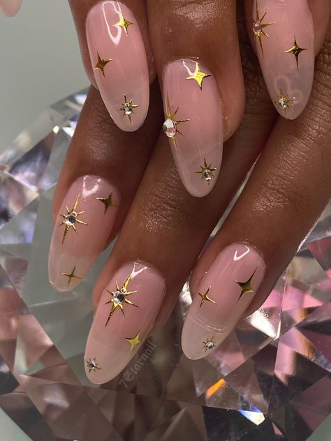 Lilac Nails Rhinestones, Pink Almond Nails With Stars, Nails With Stars And Gems, Light Pink And Sparkle Nails, Nails With Moons And Stars, Glinda The Good Witch Nails, Magenta And Gold Nails, Almond Nails Star Design, Midnights Era Nails