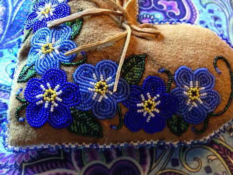 Beaded forget me not ring pillow on moosehide, Alaska native beadwork. By Liisia Carlo Edwardsen Métis Beadwork, Metis Beadwork, Forget Me Not Ring, Alaskan Art, Native Beading, Beaded Pillow, Native Beading Patterns, Forget Me Not Flower, Beadwork Designs