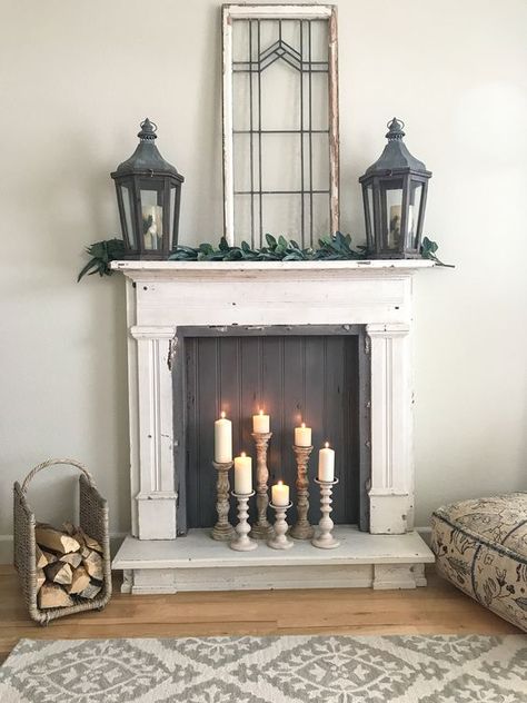 47 Adorable Fireplace Candle Displays For Any Interior Faux Fireplace Mantels, Fake Fireplace, Faux Fireplace Diy, Vintage Fireplace, Candles In Fireplace, Fireplace Mantel Decor, Farmhouse Fireplace, Bedroom Fireplace, Faux Fireplace