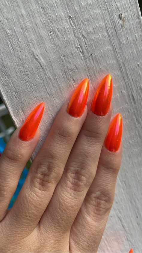 Gel extensions are the new acrylic nails. These are NOT acrylic. No filing or shaping. Gel curing in seconds, im obsessed. I have stiletto gel extensions with a bright neon orange color with a “baraquay sunset” chrome overlay Bright neon orange chrome Gel nails medium length stiletto shape summer nails Holographic Orange Nails, Neon Orange Nails Almond, Orange Mirror Nails, Bright Orange Acrylic Nails, Red Orange Chrome Nails, Orange Chrome Nails Summer, Orange Chrome Nails Fall, Neon Orange Chrome Nails, Orange Metallic Nails