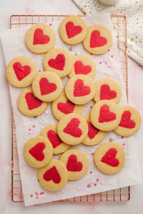 white cookies with red hearts in the middle spread out on parchment paper and cooling rack Easy Spring Desserts, Vday Cookies, Valentines Picnic, Cookies For Decorating, Pancakes Homemade, Holiday Sweet Treats, Baking Area, Valentines Day Cookie Recipe, Slice And Bake Cookies