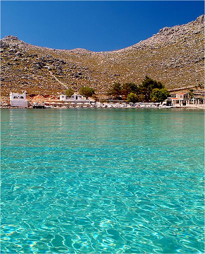 Agia Marina beach, an oasis with crystal clear waters in Symi island Symi Greece, Places In Greece, Marina Beach, Visiting Greece, Corfu, Greece Travel, Greek Islands, Pretty Places, Places Around The World