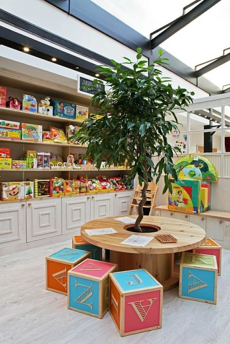 Cafe With Play Area, Preschool Design Interior, Home Preschool Room Setup, Innovative Classroom Design, Daycare Outdoor, Toy Store Design, Rocking Bed, Creative Seating, Bed Montessori