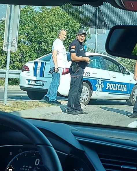 The police stop and film at the entrance to Cetinje Police Stopping Car, Traffic Police, Police Patrol, New Photo Download, Doodle On Photo, White Car, Police Car, Money And Happiness, Photo Download