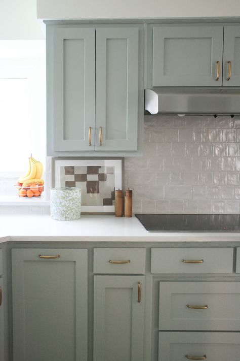 Light blue, green painted cabinets with gold hardware and zellige backsplash. Timeless Kitchen Backsplash, Backsplash Styles, Paint Colors For Cabinets, Blue Painted Cabinets, Teal Kitchen Cabinets, Blue Green Kitchen, Teal Cabinets, Best Blue Paint Colors, Light Blue Kitchens