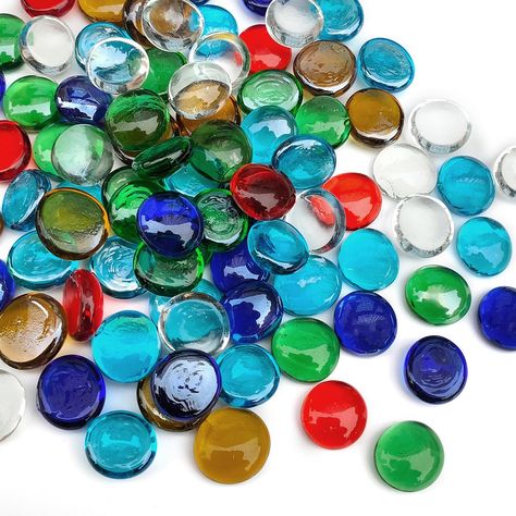 PRICES MAY VARY. 【100Pcs Flat Marbles】Mixed color flat marbles consist of dark blue, light blue, yellow, red, green and clear,1 pound glass pebbles approx 90-100 pcs. Each diameter is about 0.7-0.8 inch 【Glass Stones】Glass pebbles are made of the highest quality glass. Sturdy and durable glass,non-toxic and tasteless. Smooth surface, consistent size, recyclable and reusable. They will not float in water and they are always clean and polished. Ideal for crafts or mosaic patterns 【Vase Fillers】Man Planter Crafts, Pebbles Diy, Flat Marbles, Fire Pit Decor, Bird Fountain, Filled Vases, Glass Pebbles, Glass Rocks, Marble Decor