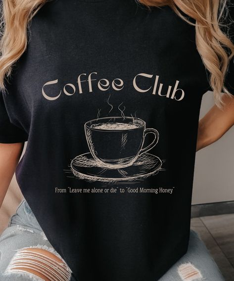 Introducing our Coffee Club Shirt, the ultimate way to express your love for all things coffee! This charming Tee is perfect for all the coffee lovers out there, with its quirky Good Morning Honey design. Whether youre a barista at heart or simply enjoy sipping your daily cup of Joe, this Daiquiri Shop, Coffee Shop Shirt, Barista Shirt, Good Morning Honey, Honey Coffee, Coffee Quotes Funny, Funny Coffee Shirts, Honey Design, Coffee Club