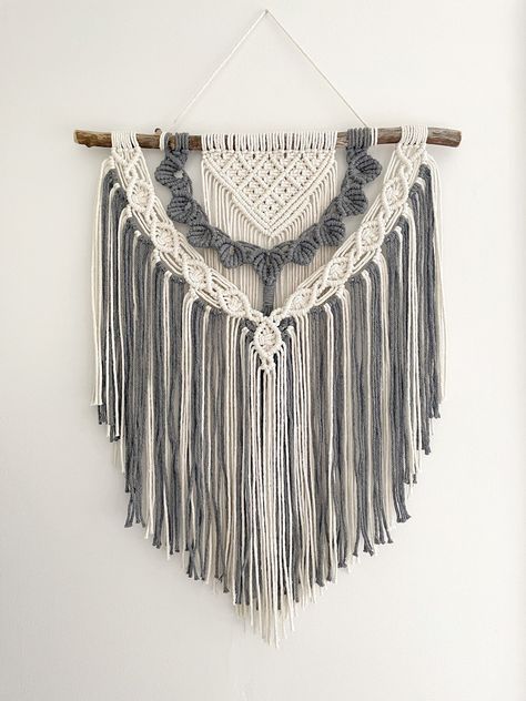 This medium macrame wall hanging is the perfect way to add a statement to your home! The driftwood adds a Bohemian vibe, and the delicate petals and mix of tones makes this art piece stand out whether you use it in your living space, office, nursery, bathroom, or bedroom. This macrame is made from 100% recycled macrame cord in the colours blue-grey and natural. The photos have been edited to best convey the true colour and details of the piece. The wall hanging measures approximately 30" in leng Medium Macrame Wall Hanging, Driftwood Macrame, Nursery Bathroom, Office Nursery, Macrame Wall Hanging Diy, Dream Weaver, Wall Hanging Boho, Tutorials Drawing, Wall Hanging Diy