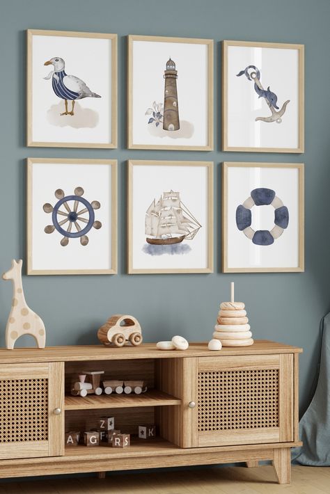 Introducing our exquisite set of 6 Nautical Nursery Prints, designed to transform your little one's space into a captivating maritime haven.Bring the allure of the sea into your child's nursery with our set of 6 Nautical Nursery Prints. Watch as their eyes light up with wonder and their imagination sets sail on countless adventures. Whether as a gift or a cherished addition to your own home, these prints will create a truly magical and inspiring environment for your little one. Upscale Playroom, Boat Nursery Theme, Vintage Nautical Nursery, Nautical Nursery Ideas, Boy Nursery Nautical, Nautical Boys Room, Nautical Kids Bedroom, Nautical Boy Room, Nautical Baby Nursery