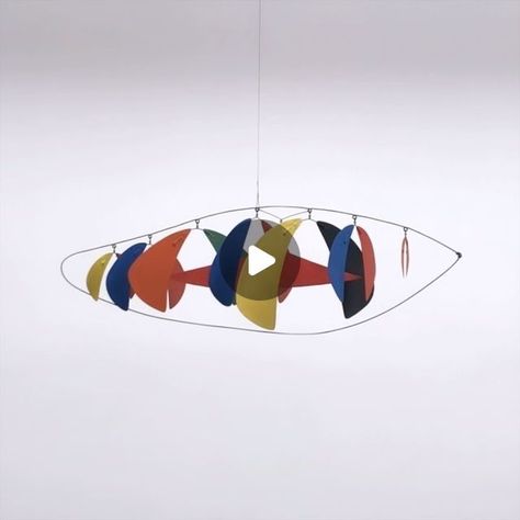 Calder Foundation on Instagram: "Alexander Calder: Recent Works opened at Pierre Matisse Gallery in New York City on this day in 1941. “When agitated by the slightest breath of wind, [the mobiles] take on, in effect, the static rhythms of abstract design set in motion … the so-called leaves of the mobile are colored in various hues with due regard for possible contrasts and harmonies, the effect is fascinating,” Melville Upton wrote in a review of the exhibition published in the New York Sun. “The mere passing of a person through the room sets them in motion and weaves his slow or brusque movement into visible harmonies as haunting and suggestive as the strains of distant music.” The hanging mobile captured here was included in the 1941 exhibition and is currently on view in Enchanted Reve Mobile Hanging Ideas, Alexander Calder Mobile, Calder Mobile, Alexander Calder, Hanging Mobile, The Exhibition, Color Shapes, Design Set, Room Set