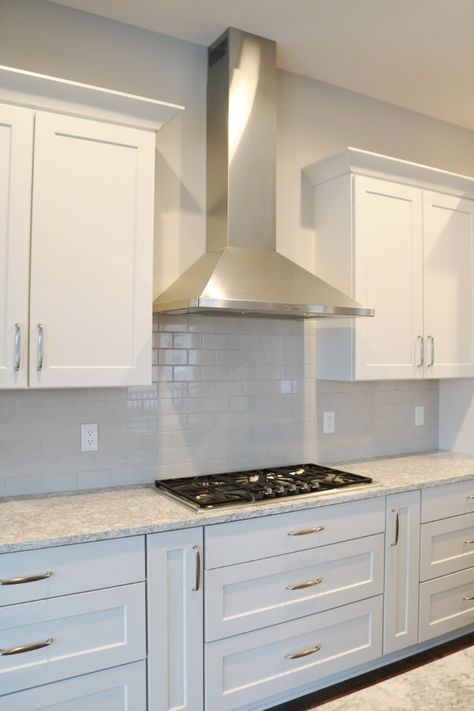 Range Hood And Cabinets, White Kitchen With Stainless Steel Hood, Backsplash Behind Range Hood Stainless Steel, Kitchen Hood Design Stainless Steel, Stainless Steel Range Hood White Kitchen, Chimney Hood Backsplash, Classic Neutral Kitchen, Kitchen Ideas Range Hood, Stainless Kitchen Hood