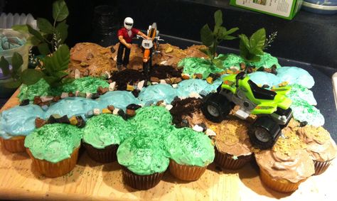 Tanner's dirt bike cupcake cake Dirt Bike Cupcake Cake, Dirt Bike Cupcakes, Motorcycle Birthday Cakes, Motorcycle Birthday, Bike Birthday, Bike Cakes, Dirt Bike Birthday, 7th Birthday Cakes, Pull Apart Cake