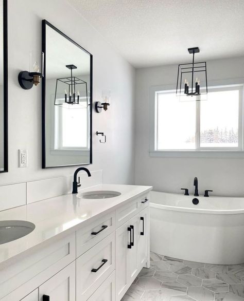 Whether you're revamping your real-life space or adding a touch of luxury to your virtual world, these ideas are sure to make a statement. #BathroomIdeas #BlackAndWhiteDecor #SmallBathrooms #BloxburgBuilds #MonochromeDesign #HalfBathInspo #ChicInteriors #HomeDecor #InteriorDesign #SpaceSavingIdeasHome Powder Room White Vanity Black Hardware, Masculine White Bathroom, Black White Gray Master Bath, White And Black Bathroom Ideas Modern, White Grey And Black Bathroom, Greyscale Bathroom, Modern Bathroom Design Black And White, White Bathroom Black Fixtures, White Bathroom With Black Fixtures