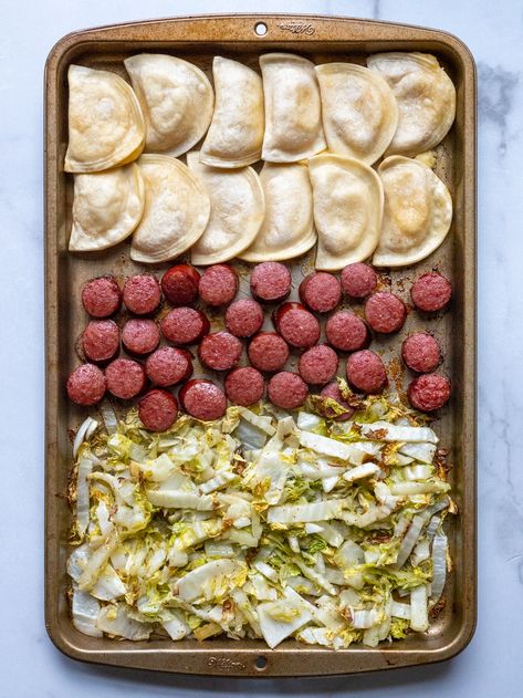 Sheet Pan Kielbasa and Pierogi Dinner?utm_source=12tomatoes Pierogi Sheet Pan, Sheet Pan Perogies And Sausage, Fall Dinner Recipes Sheet Pan, Pierogi Dinner, Sheet Pan Kielbasa, Sheet Dinner, Pierogi Recipes, Sheet Meals, Kielbasa And Cabbage