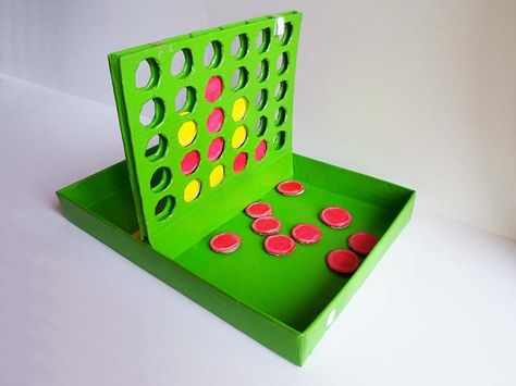 Connect Four is such a famous game that most of you must have played it at least once in your life! I had both the regular and pocket version when I was little and it's one of the games I played the most with. I still have the big one, even though some discs are missing... The base seems pretty easy to make so I thought I would try to build it using cardboard! As you can probably notice from my other instructables, I love cardboard because you can do so many different things with it! And let'... Cardboard Diy, Connect Four, Cardboard Box Crafts, White Glue, Diy Games, Diy Cardboard, Using Acrylic Paint, Cardboard Crafts, Tutorial Diy