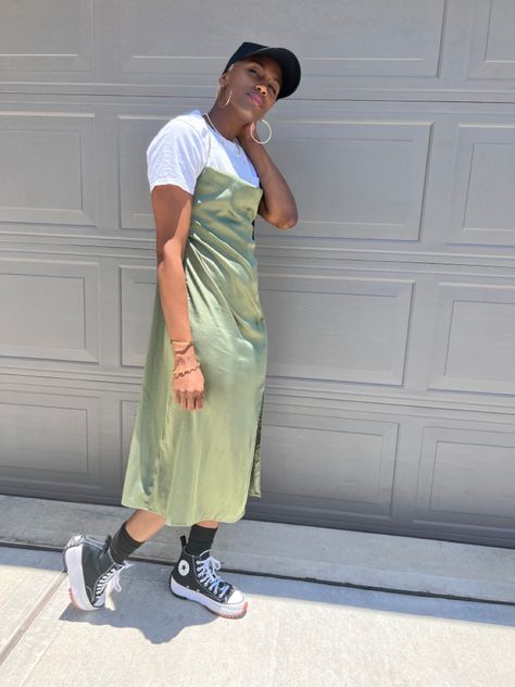 Casual Fit- green slip dress with white under, black socks, platform converse, black 1 hat #blackgirlfashion Slip Dress Sweatshirt, Slip Dress With Shirt Under, Dress With T Shirt Underneath, Dresses With Tshirts Under, Spaghetti Dress With Shirt Under, Green Slip Dress Outfit, T Shirt Under Dress Outfits, Tshirt Under Dress Outfit, Tshirt Under Dress