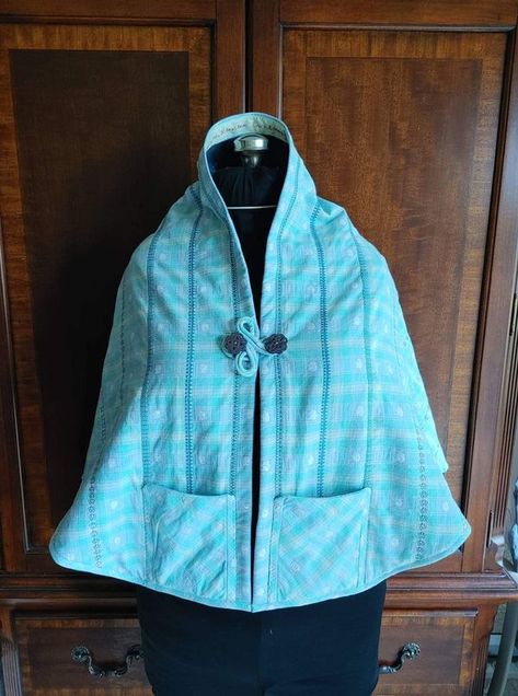 Quilted Hug Project Quilted Shawl Patterns Free, Quilted Blanket Shawl, Quilted Hug Project Pattern, Functional Quilted Hooded Outerwear, Quilt Hug Project, Quilted Hug Shawl Pattern, Quilted Blue Hooded Outerwear, Quilt Coat Pattern, Christmas Gifts To Make