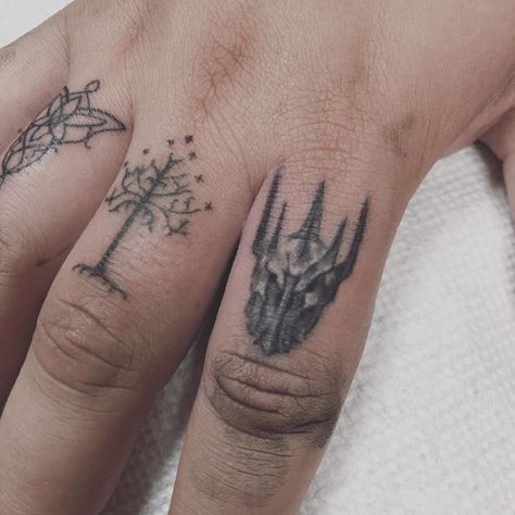 26 Rad LORD OF THE RINGS Tattoos | Book Riot Lotr Tattoo Ideas, Hobbit Tattoo, Tolkien Tattoo, Ring Tattoo Designs, Small Wave Tattoo, Tato Tradisional, Lotr Tattoo, Rings Tattoo, Lord Of The Rings Tattoo