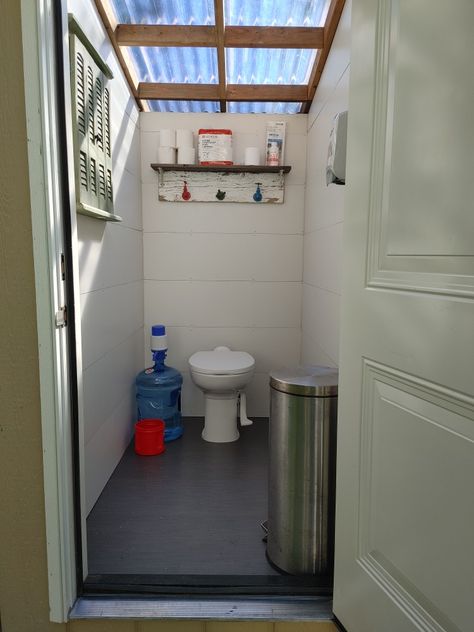 Re did outhouse with an rv toilet Modern Outhouse Bathroom, Modern Outhouse Ideas, Outhouse Makeover, Garden Toilet Ideas, Pool Outhouse, Diy Outhouse Bathroom, Outside Toilet Ideas, Outhouse Bathroom Ideas, Simple Outhouse