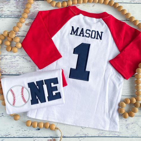 This is always a favorite and especially during baseball season - baseball ⚾️NE birthday shirt with ⚾️NE on the front and name and number on the back. Such a super sweet birthday shirt 😍 #baseballone #baseballbirthday #makingmemories #firstbirthdayboy #⚾️boy #baseballsummer #embroideredshirt Baseball Birthday Outfit, Astros Birthday Shirt For Boys, Custom Baseball Shirt With Kid Picture, Baseball Birthday Shirt, Baseball Birthday Shirt Boys, Sweet Birthday, Baseball Birthday, Baseball Season, Birthday Boy