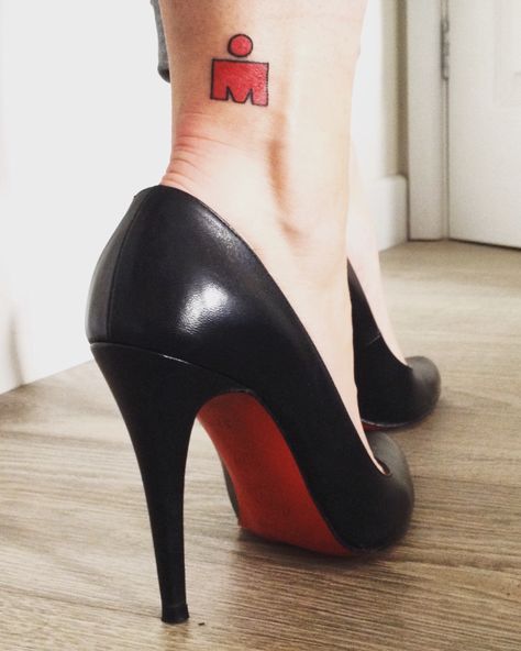 My Ironman tattoo in Christian Louboutin heels.                              … Ironman Tattoo Triathlon, Ironman Triathlon Motivation, Ironman Triathlon Tattoo, Triathlon Transition, Ironman Tattoo, Triathlon Inspiration, Triathlon Tattoo, Iron Man Race, Iron Man Tattoo