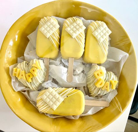 Chocolate cake hearts and cakesicles, covered in a yellow chocolate, topped with edible glitter Yellow Cakesicles, Cake Sicles, Treats Business, Buttercup Yellow, Edible Glitter, Cake Pops, Chocolate Cake, Cheese Board, Sweet Treats