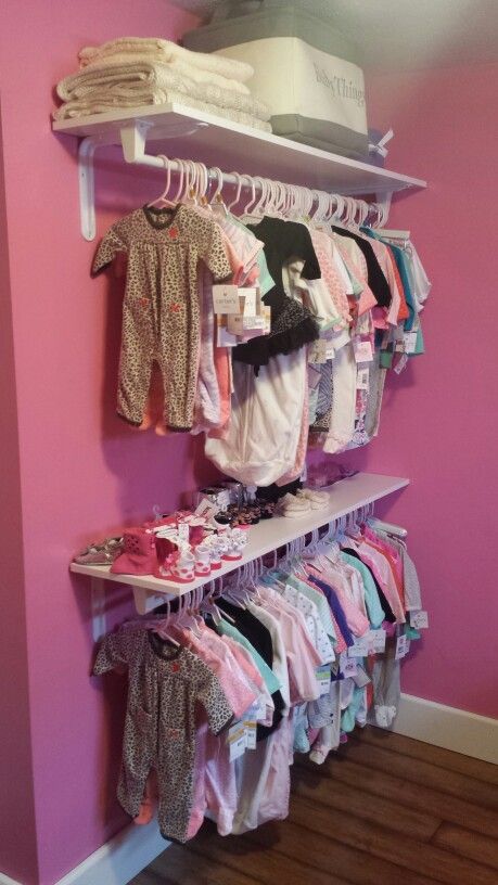 Twin girls on the way;small nursey & no closet. We decided to improvise and us wall shelves and towel rods. ♡ Turned out beautiful & didnt have to use an extra piece if furniture. Small Nursery Ideas No Closet, Wall Closet For Small Bedroom, Small Wall Closet Ideas, Wall Clothing Shelves, Clothing Organization No Closet, Clothing Rods On Wall, Nursery With No Closet Ideas, Small Nursery No Closet, Shelves In Bedroom For Clothes