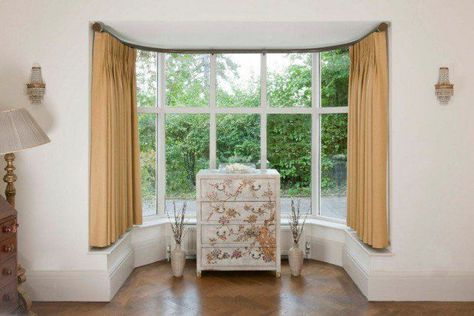 17 Simple But Adorable Bay Window Curtains Designs #Windows #Treatments #Curtains #Ideas Short Bay Window Curtains, Short Curtains Bay Window, Bay Window Curtain Ideas, Bay Window Curtain Poles, Curved Curtain Rods, Bay Window Treatments, Short Window Curtains, Window Curtain Designs, Bay Window Curtain Rod