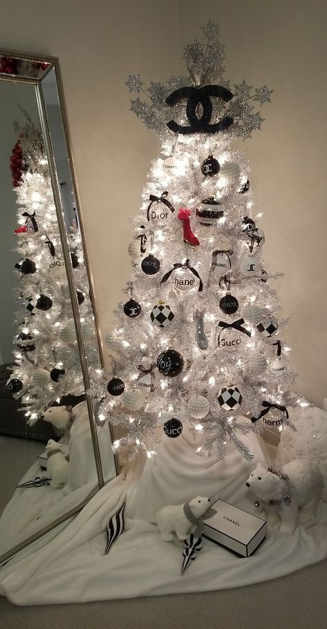 Lv Christmas Tree, Chanel Tree Christmas, White Christmas Tree Black Ornaments, White Tree Black Ornaments, Chanel Christmas Tree Ideas, Chanel Christmas Tree, After Christmas Decorating Ideas, Black White Christmas Tree, Chanel Christmas