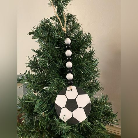 Soccer Ornament Wood Bead Garland Style. New Item. Great For A Soccer Fan Or A Soccer Mom Or Dad. The Jute Hanger Helps You Hang It From Any Plant Or On A Christmas Tree Or Hanging Off Of A Tiered Tray. In Box Up-6 Holiday Wreath Craft, Nightmare Before Christmas Ornaments, Frog Ornaments, Soccer Fan, Senior Gifts, Glass Christmas Tree Ornaments, Bead Garland, Wood Bead Garland, Baby First Christmas Ornament