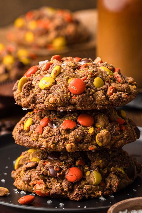 This Gideon's Bakehouse Copycat Recipe for Peanut Butter Cold Brew Cookies is a dense, fudge-like, overindulgent treat! Peanut butter cookies made from scratch with ground espresso are rolled in crushed Reese's Pieces, chopped Reese's peanut butter cups, and ground espresso! Cold Brew Cookies, Colossal Cookies Recipe, Gideon Cookie Recipe, Gideons Bakehouse Cookie Recipe Copycat, Gideons Cookies Recipe, Gideons Bakehouse Cookie Recipe, Jumbo Cookie Recipe, Gideon’s Cookies Recipe, Gideons Bakehouse Cookie Recipe Peanut Butter