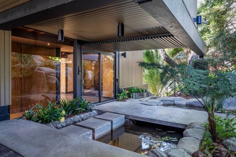 Photographer Todd Selby Lists the Franks House by Raúl Garduno for $3.4M - Dwell Pond Waterfall, Floating Staircase, Modern Appliances, Front Entrances, Park Homes, Main Entrance, Koi Pond, Play Houses, Midcentury Modern